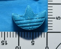 Blue tablet in the shape of the Adidas logo
