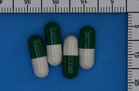 Green and white capsules