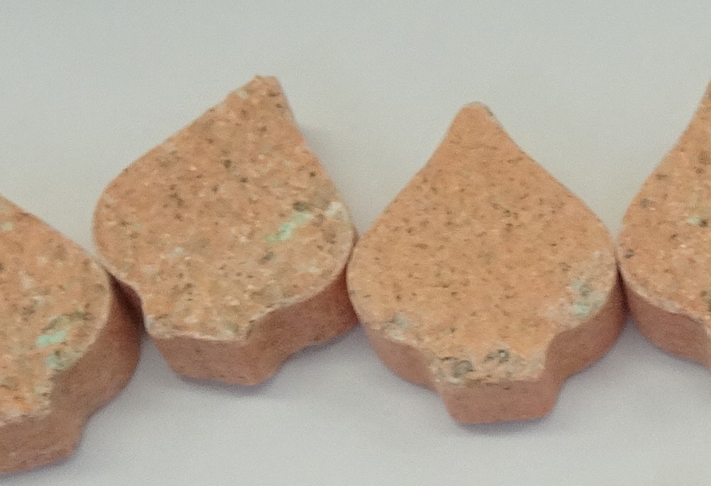 Pink MDMA tablet with line etched in middle