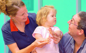 Health professionals with child