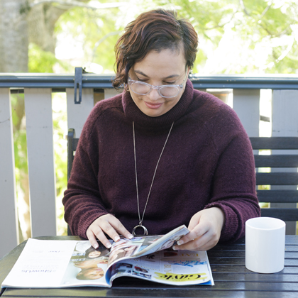 Woman reading magazine