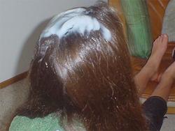 Head of long hair with conditioner