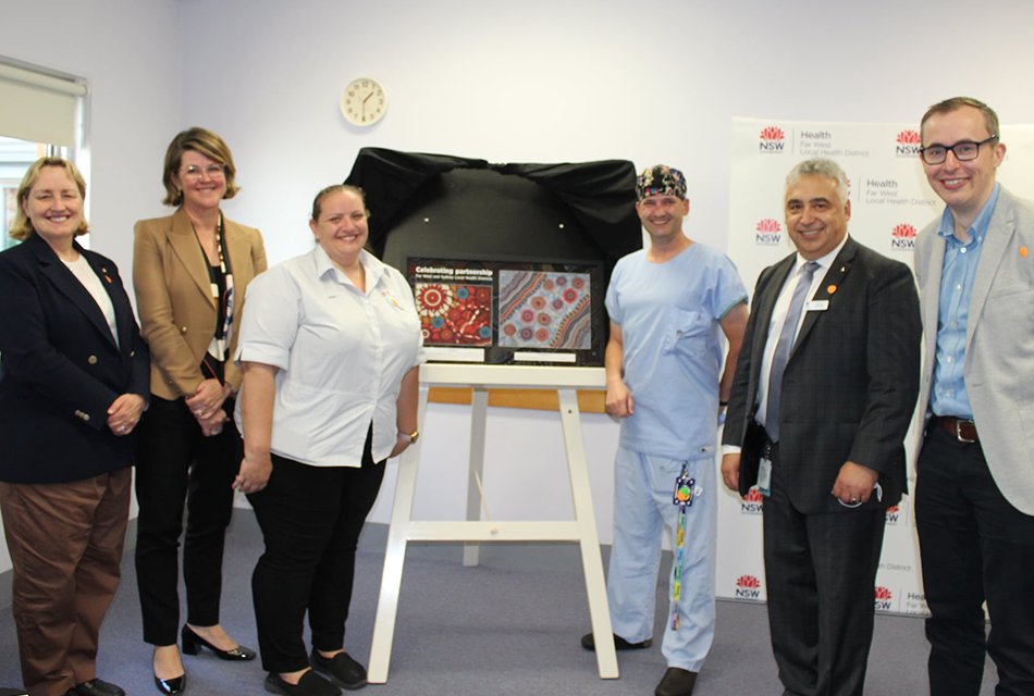 Teresa Anderson and Susan Pearce with staff from Broken Hill Health Service.