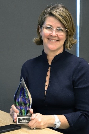 Health Secretary Susan Pearce with award.