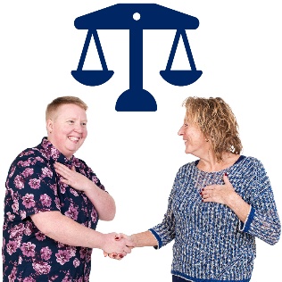 2 people shaking hands.