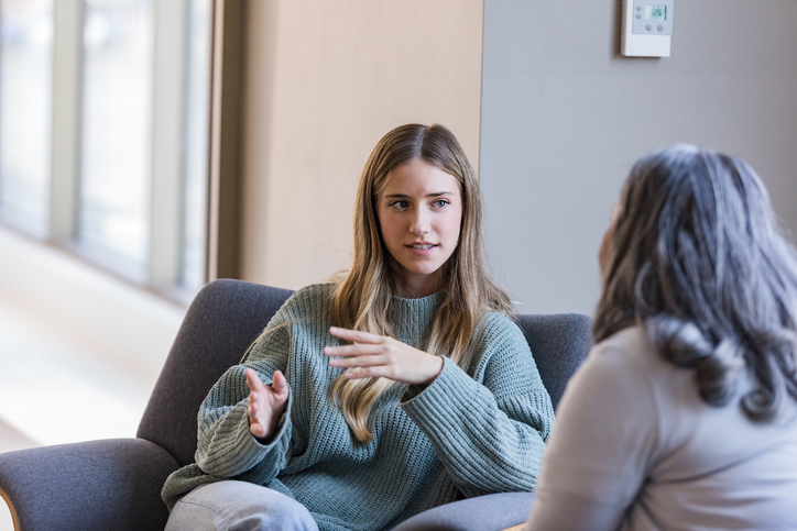 Counsellor having a conversation with a patient