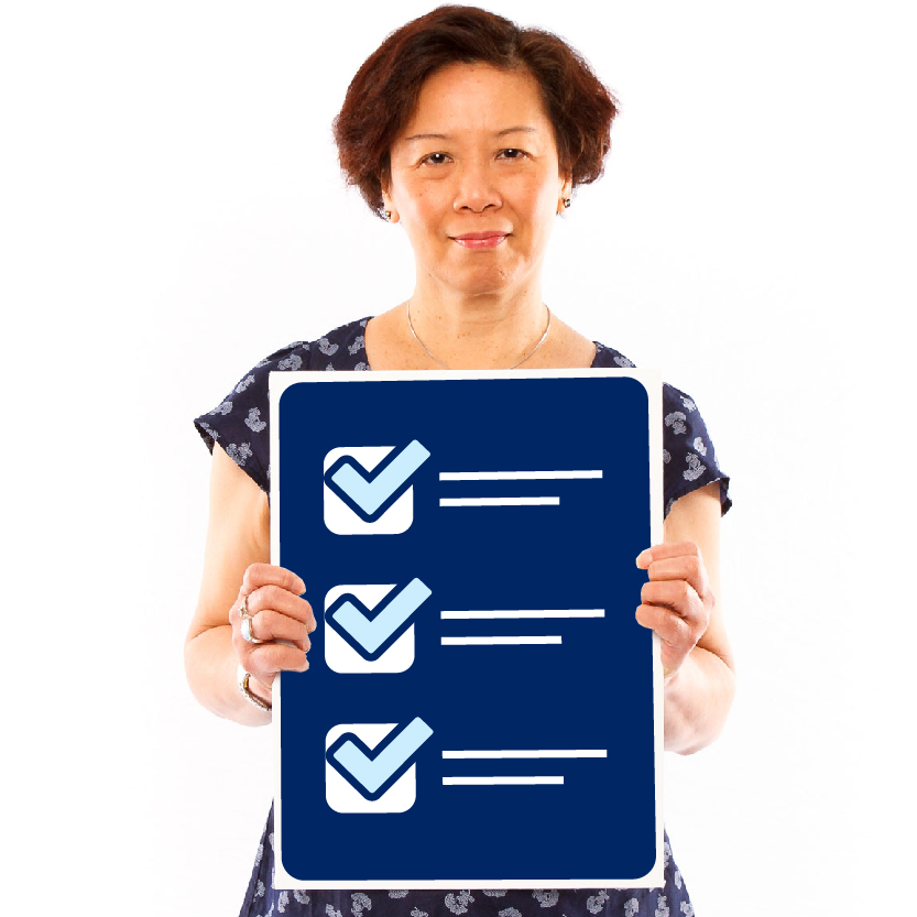 A person holding a rules document. The document has ticks next to each item on it.