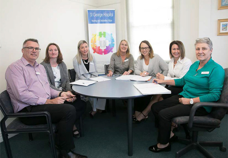 Diverse group of employees having a meeting