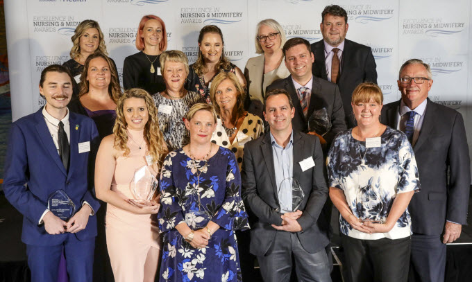 THe Hon. Brad Hazzard, Minister for Health and Jacqui Cross, Chief Nursing and Midwifery Officer with winners of the 2018 Excellence in Nursing and Midwifery Awards